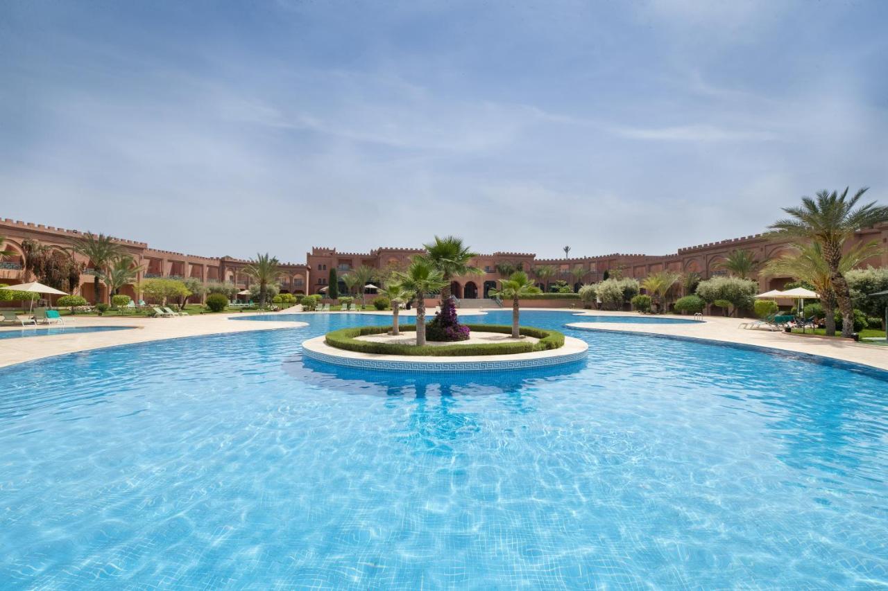 Grand Mogador Agdal Palace Marrakesh Exterior foto The swimming pool at the hotel