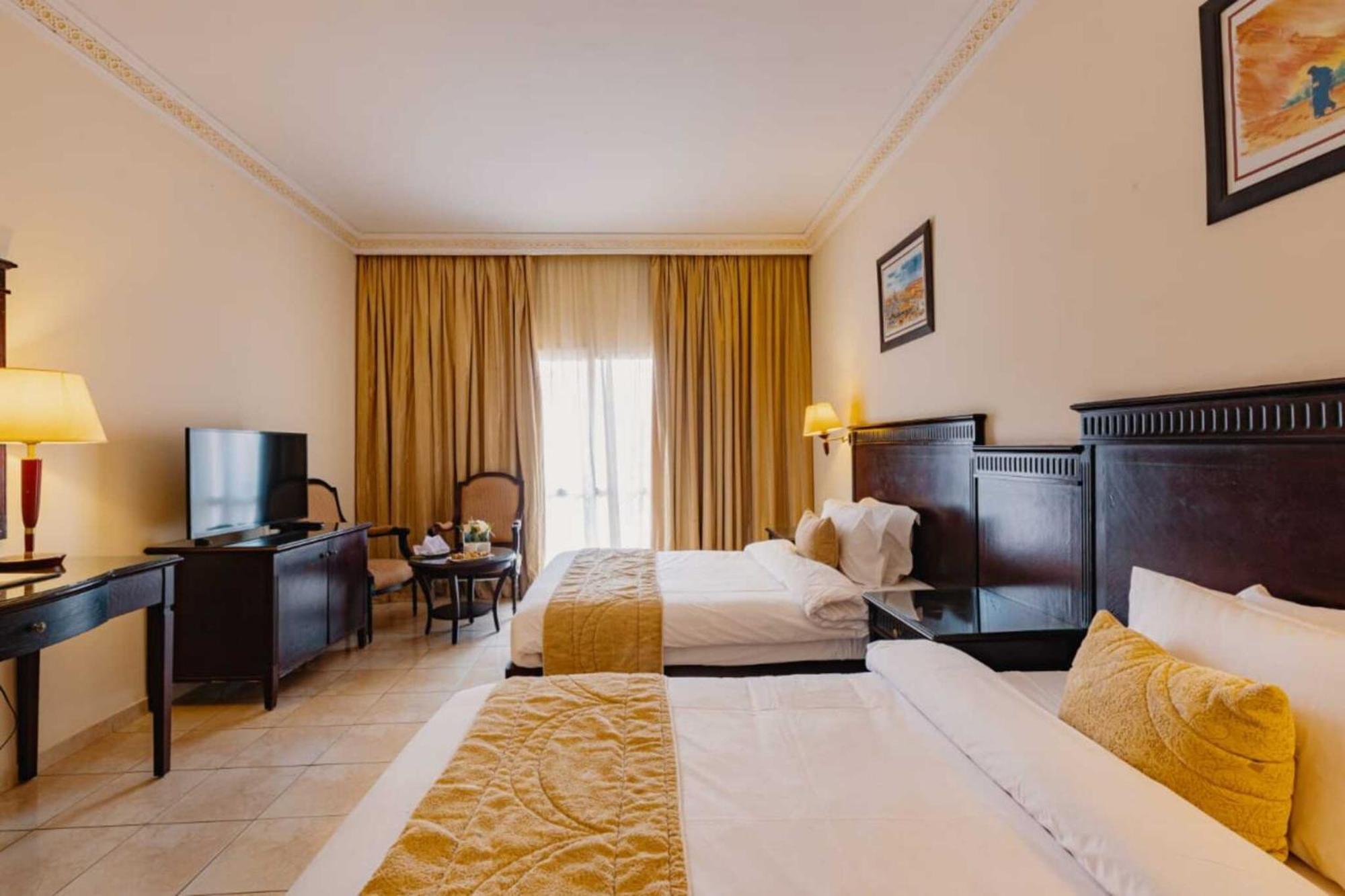 Grand Mogador Agdal Palace Marrakesh Exterior foto A room at the hotel